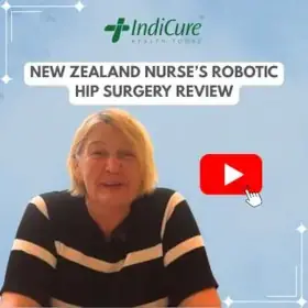 A headshot of a smiling New Zealand nurse named Claire Olsen. The image promotes her review of robotic hip surgery with IndiCure Health Tours.